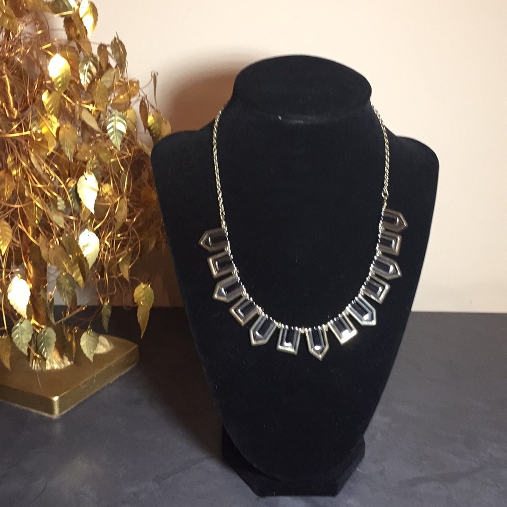 Gold/silver/gunmetal toned necklace.